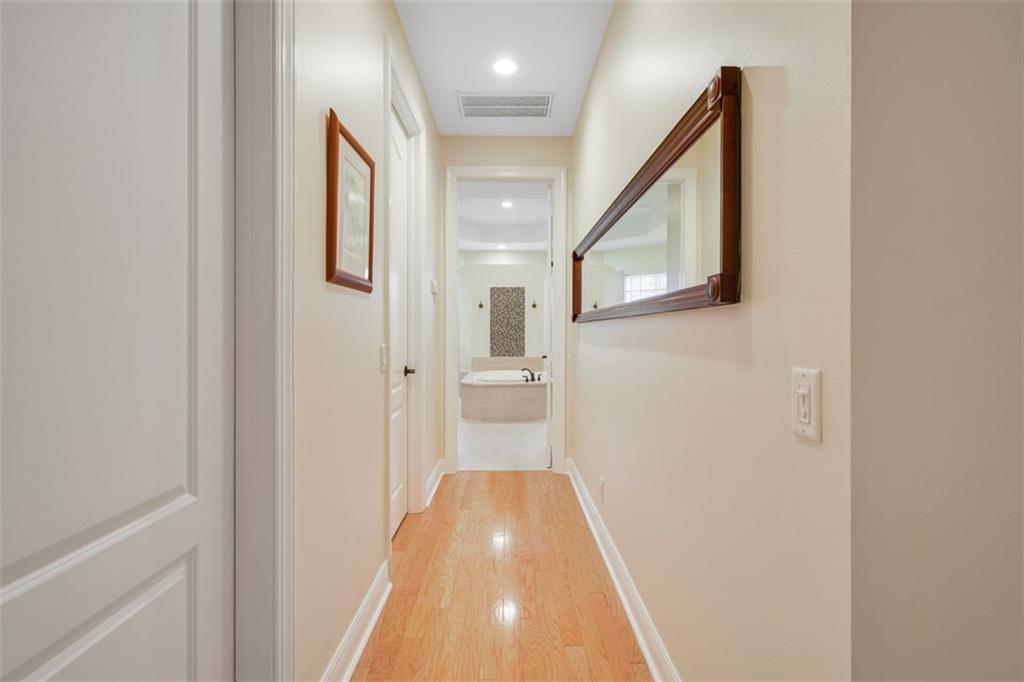 4920 Southeast Inlet Isle Way Stuart, FL 34997 - Photo 17 of 29 Master closets and hallway to Master Bath