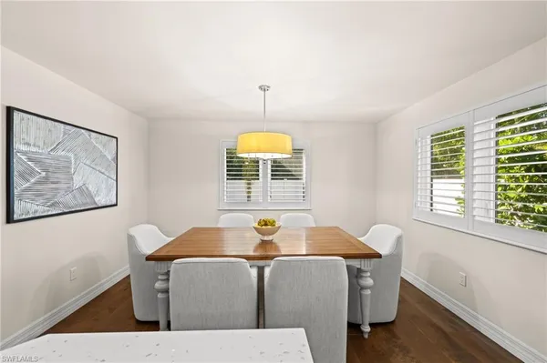 a living room with furniture and window