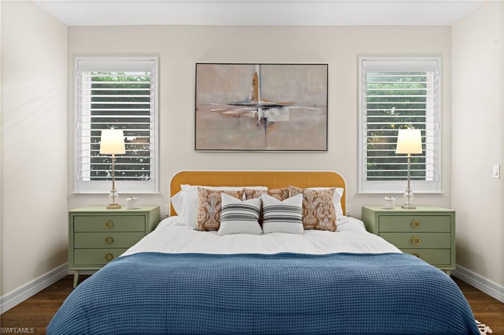 2499 10th Street North Naples, FL 34103 - Photo 16 of 33 a bedroom with a bed and window