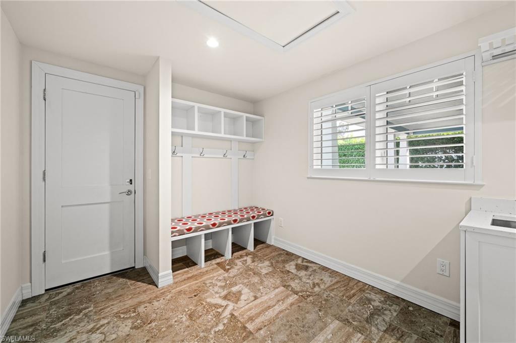 2499 10th Street North Naples, FL 34103 - Photo 29 of 33 a view of an empty room with a window