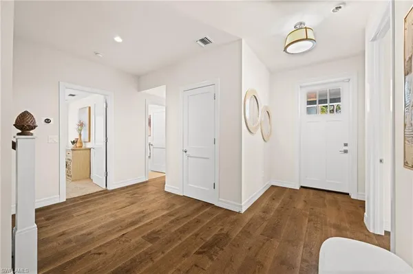 a view of livingroom with hardwood floor and a ceiling fan