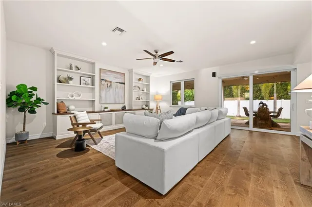 a living room with furniture and a couch