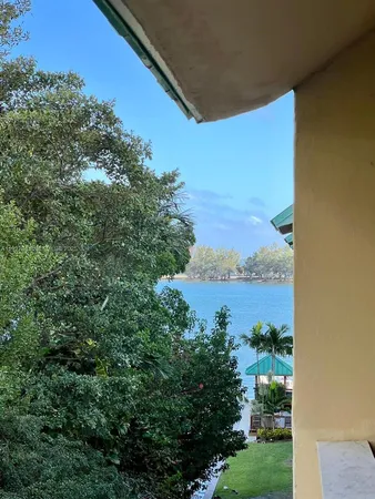 a view of a lake from a balcony