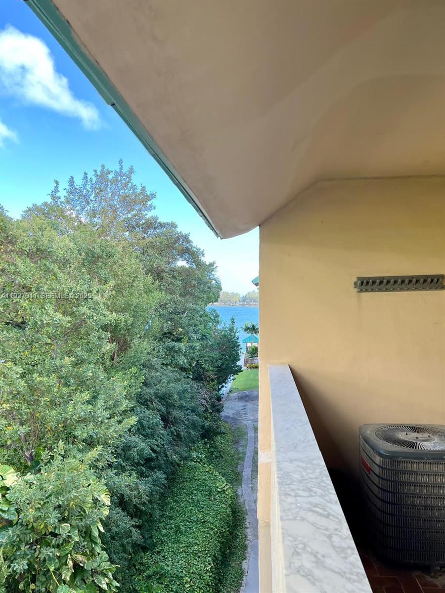 2201 Brickell Avenue, Unit 83 Miami, FL 33129 - Photo 5 of 16 a view of balcony with furniture