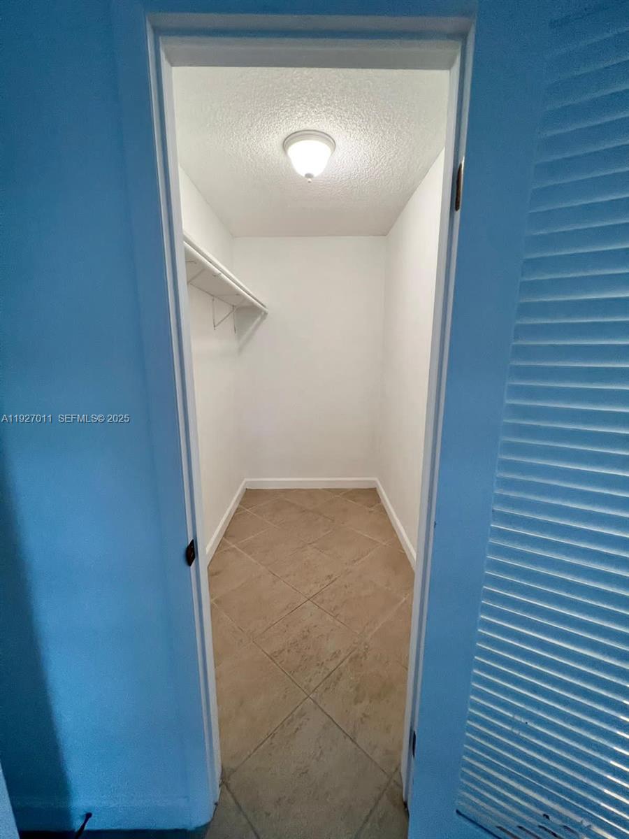 2201 Brickell Avenue, Unit 83 Miami, FL 33129 - Photo 7 of 16 a view of a hallway