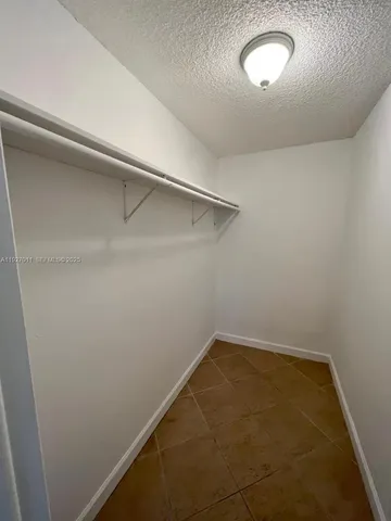 an empty room with a workbench