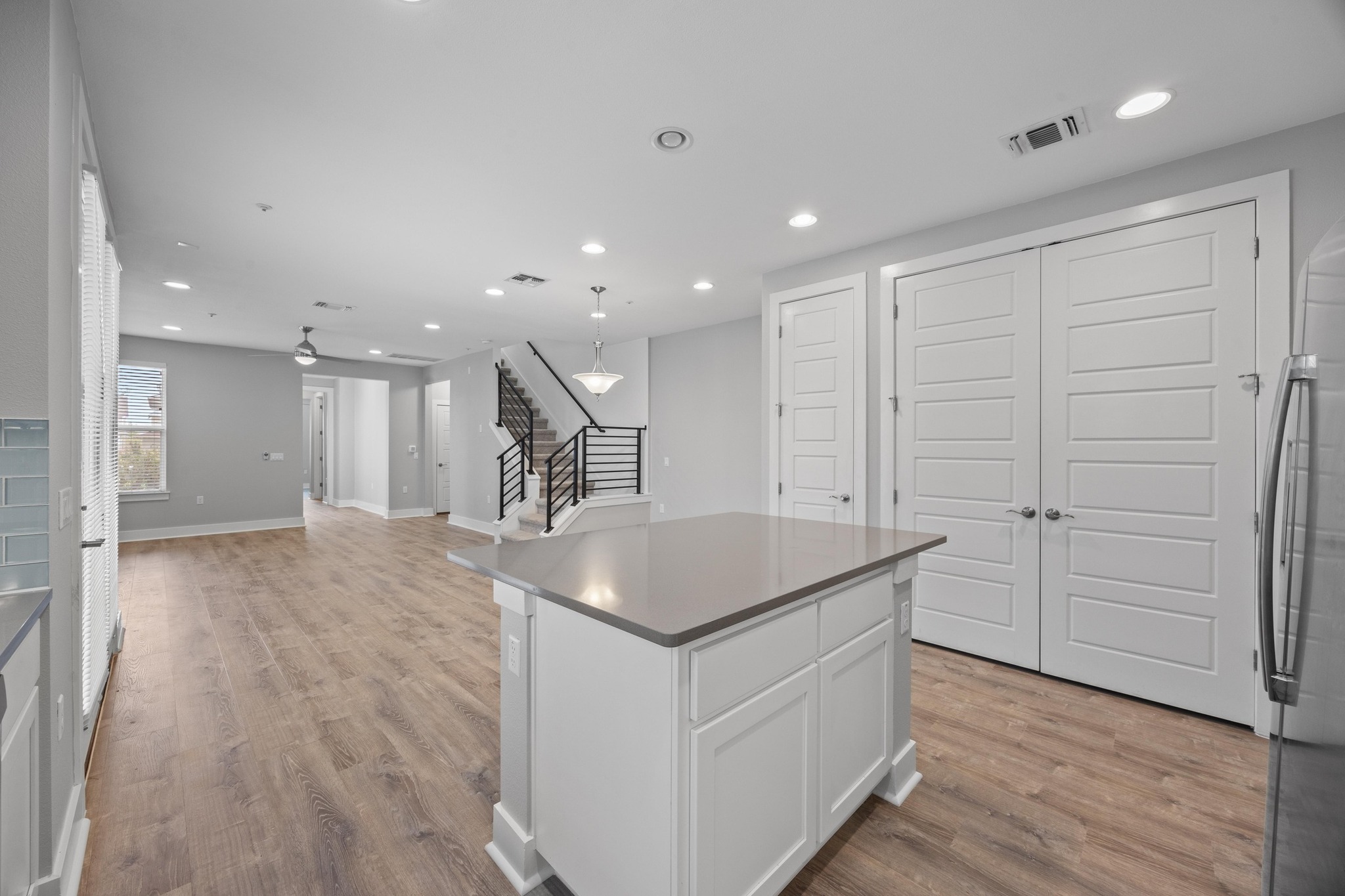 2222 Simond Avenue, Unit E Austin, TX 78723 - Photo 10 of 28 The kitchen looks out into the living area.
