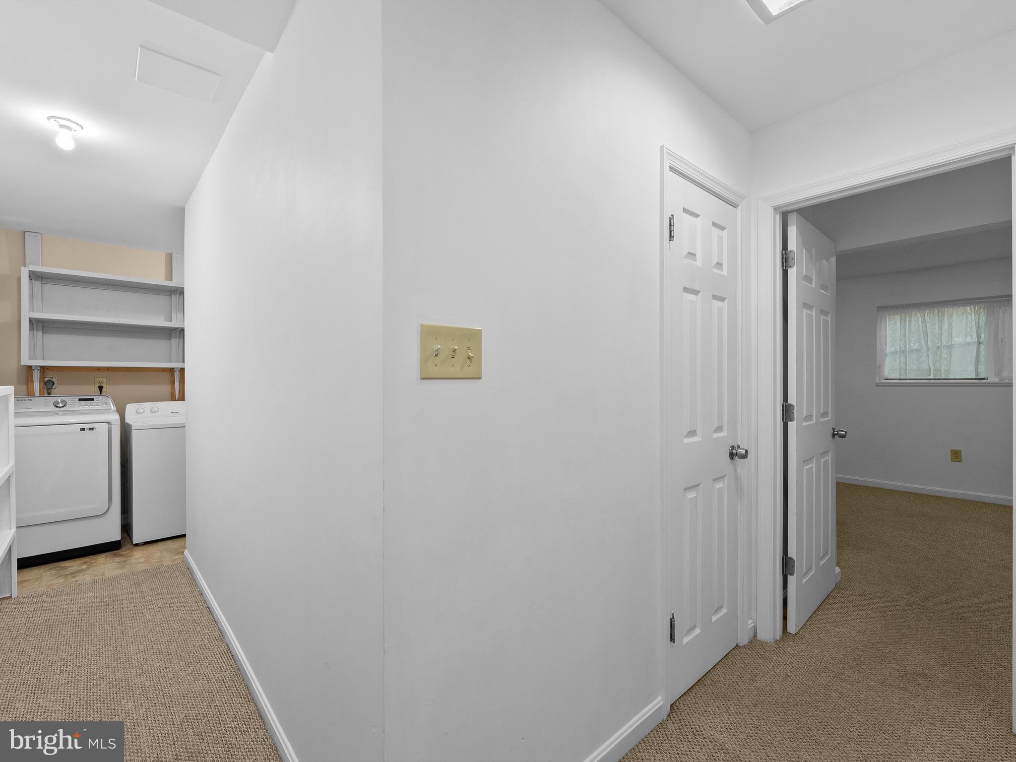 2459 Pyrenees Court Reston, VA 20191 - Photo 21 of 28 a view of a hallway to a room with a window