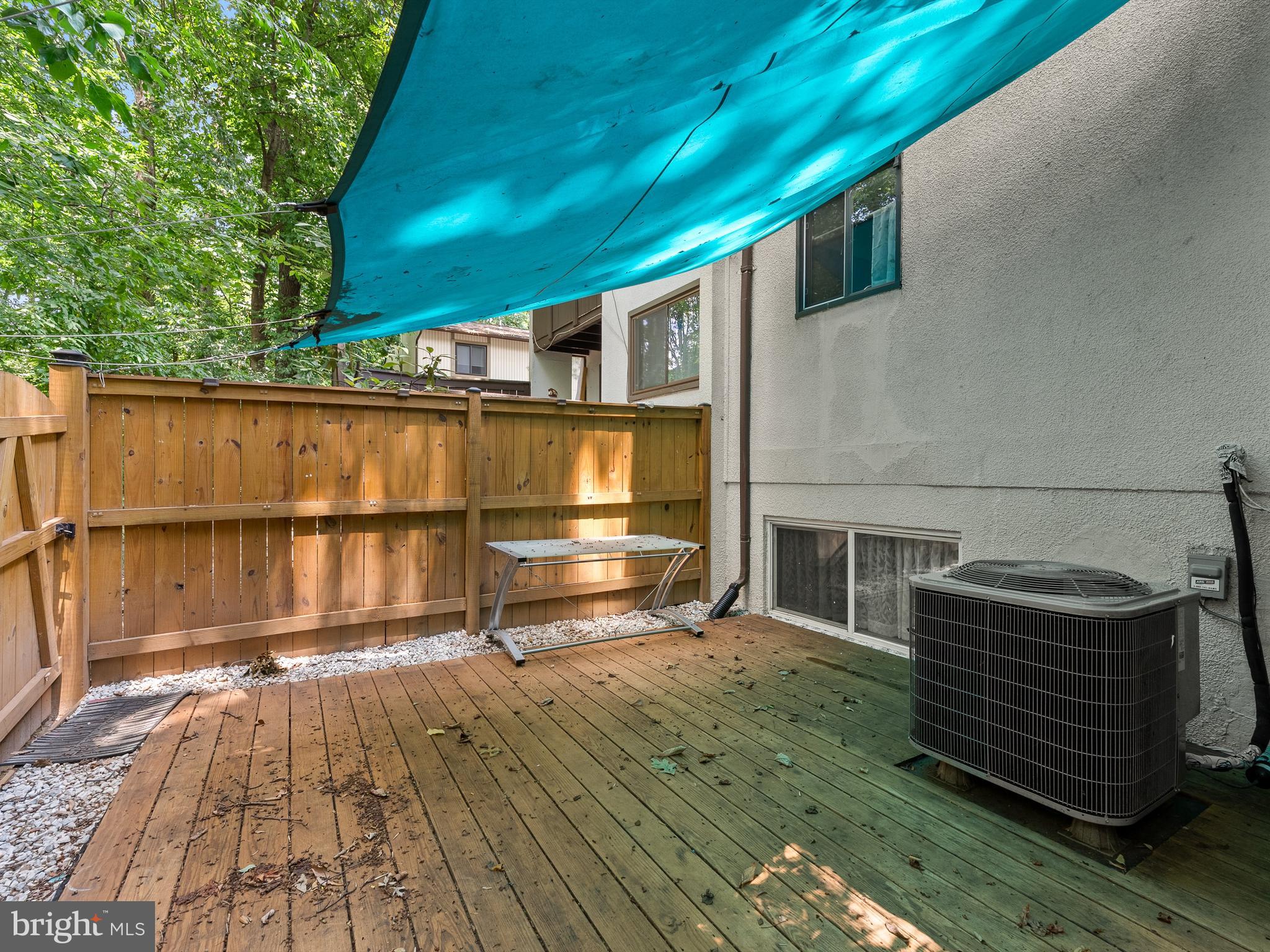 2459 Pyrenees Court Reston, VA 20191 - Photo 28 of 28 a view of backyard with a deck and wooden floor