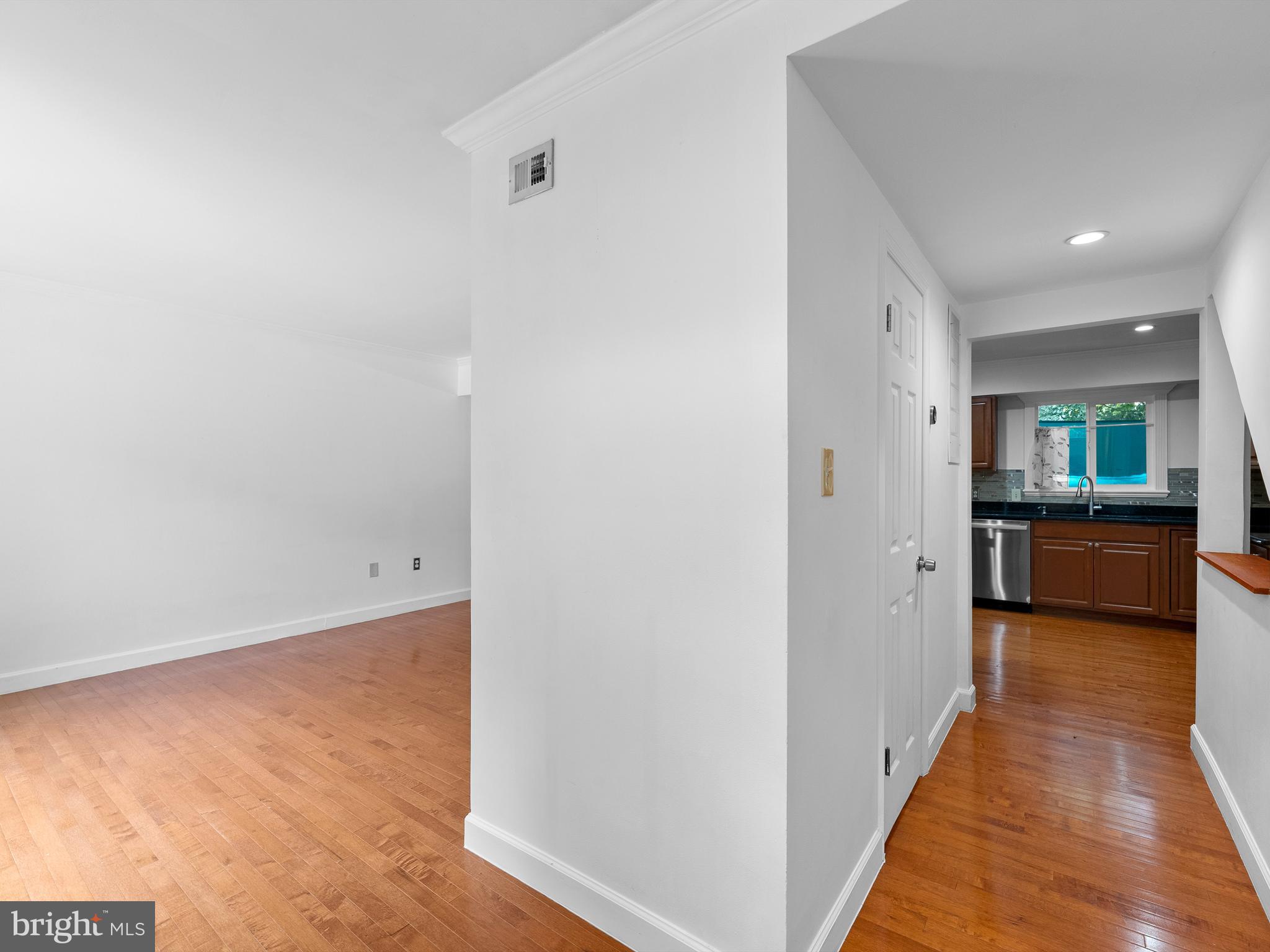 2459 Pyrenees Court Reston, VA 20191 - Photo 4 of 28 a view of a kitchen from the hallway
