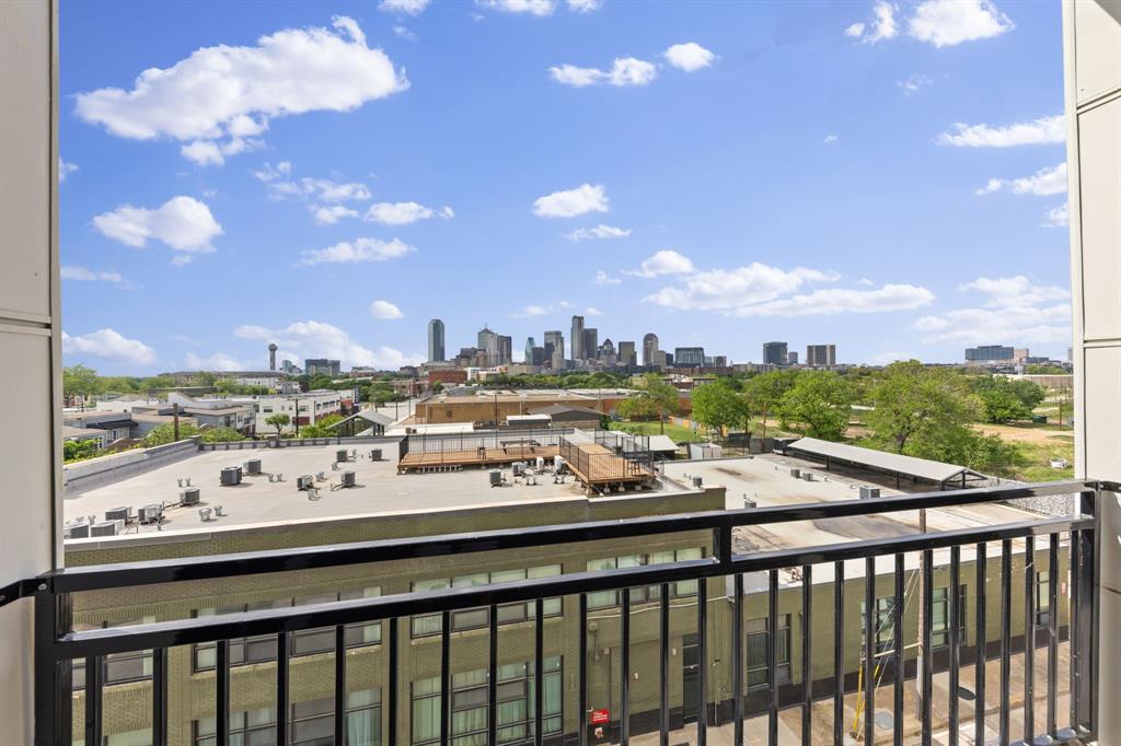 1900 South Ervay Street, Unit 508 Dallas, TX 75215 - Photo 25 of 36 a view of a city view from a balcony