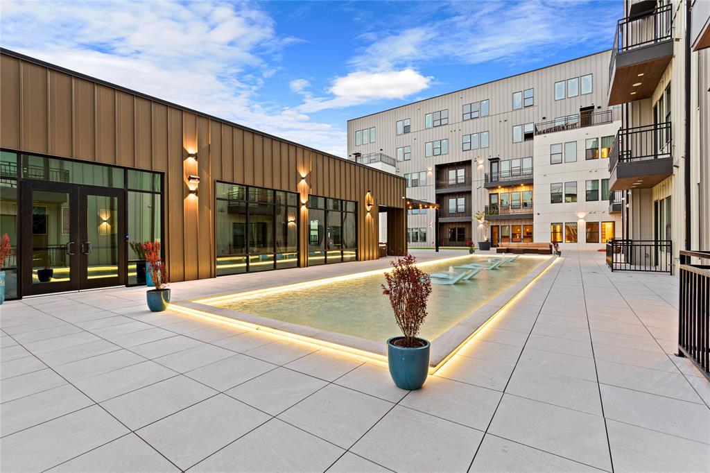 1900 South Ervay Street, Unit 508 Dallas, TX 75215 - Photo 27 of 36 a view of a building with a fountain