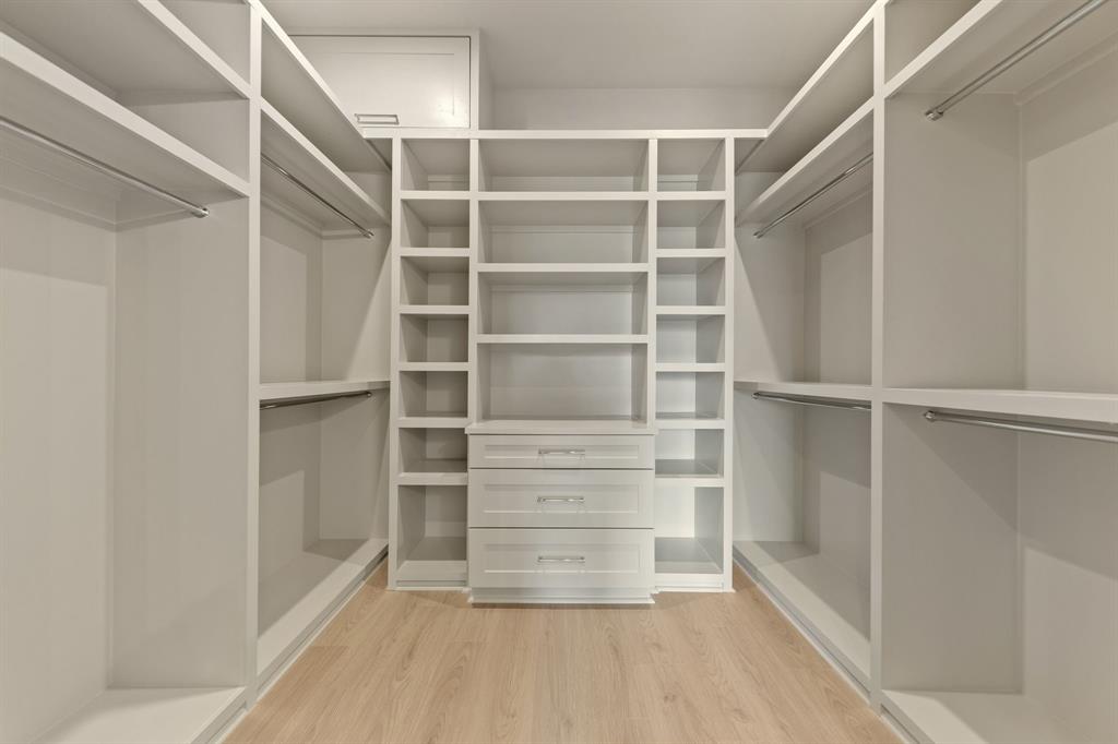 1900 South Ervay Street, Unit 508 Dallas, TX 75215 - Photo 9 of 36 a view of walk in closet with empty racks