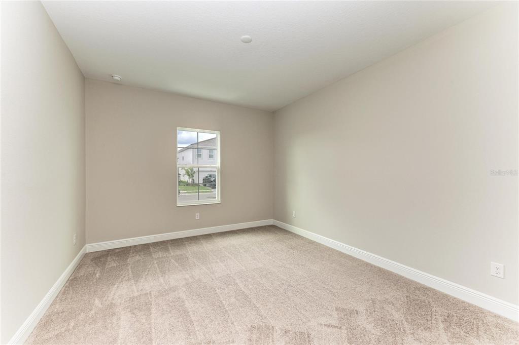 17915 Cropside Trail Lakewood Ranch, FL 34211 - Photo 22 of 33 a view of an empty room with a window