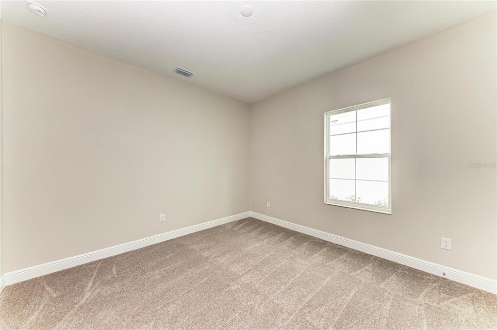 17915 Cropside Trail Lakewood Ranch, FL 34211 - Photo 25 of 33 an empty room with a window