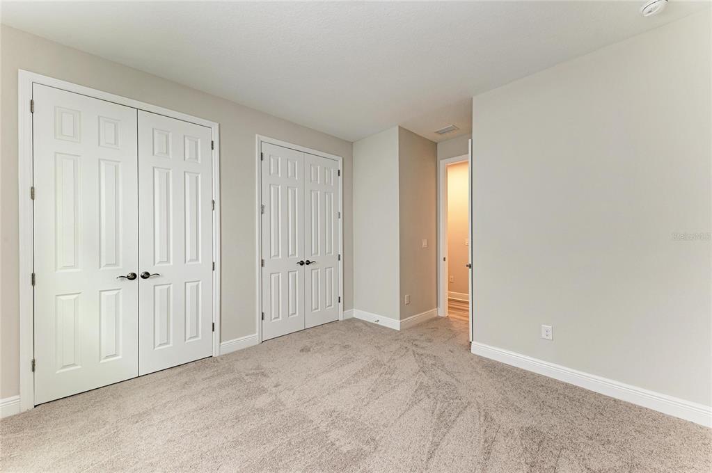 17915 Cropside Trail Lakewood Ranch, FL 34211 - Photo 26 of 33 a view of an empty room and closet area