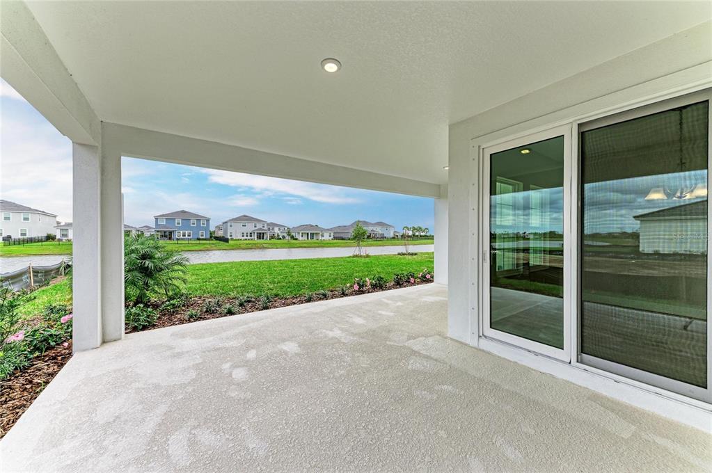 17915 Cropside Trail Lakewood Ranch, FL 34211 - Photo 32 of 33 a view of a garden with an outdoor seating