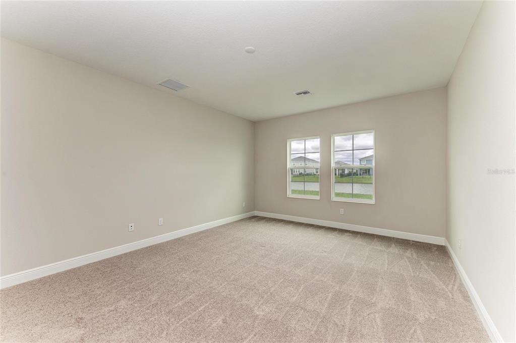 17915 Cropside Trail Lakewood Ranch, FL 34211 - Photo 5 of 33 an empty room with a window