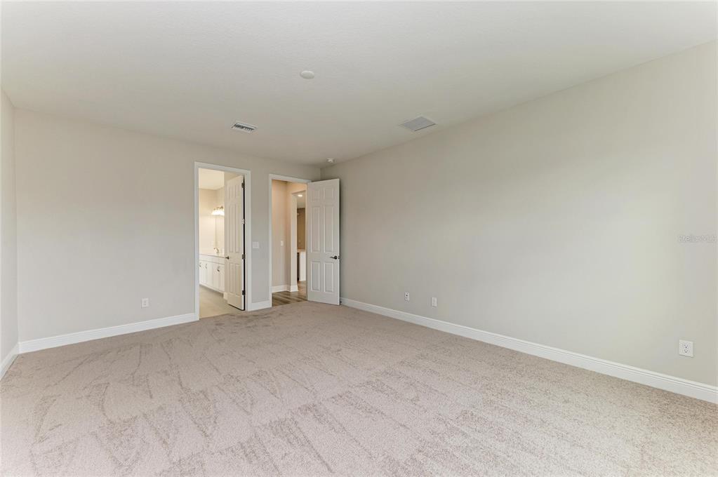 17915 Cropside Trail Lakewood Ranch, FL 34211 - Photo 6 of 33 an empty room with an entryway