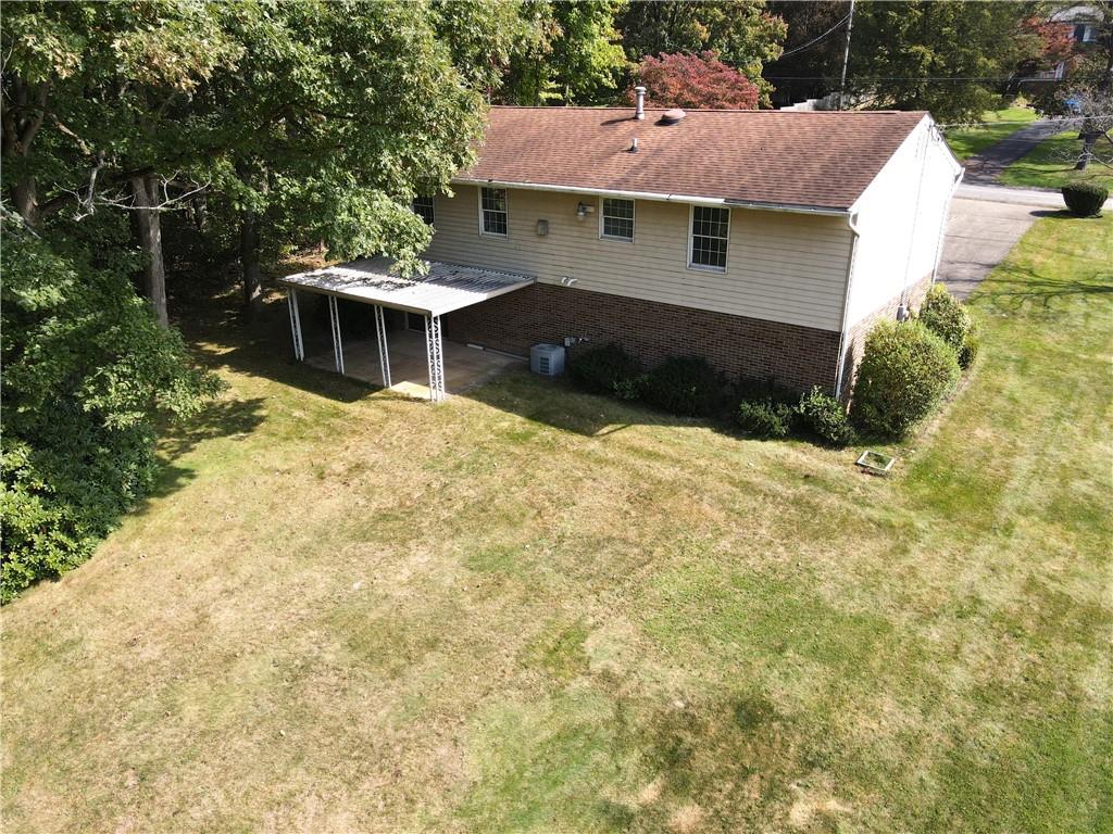 122 Clover Road Baden, PA 15005 - Photo 25 of 30 a front view of a house with a yard
