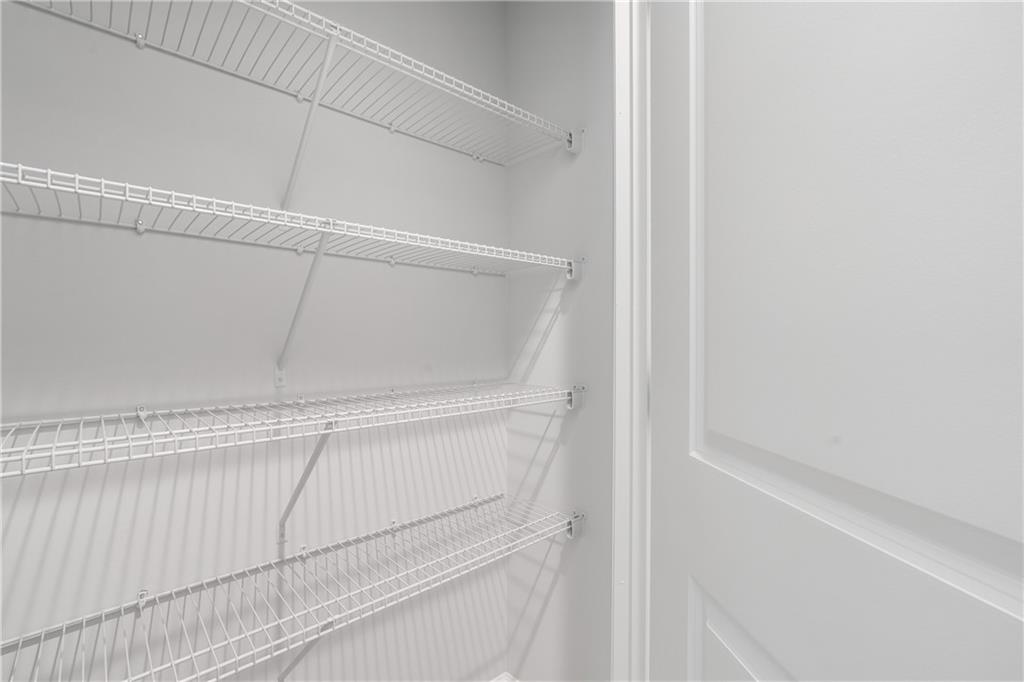 4477 Rivercliff Way Gray, GA 31032 - Photo 50 of 62 a close up view of racks on the wall