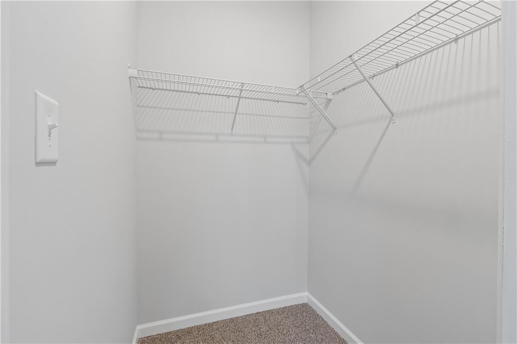 4477 Rivercliff Way Gray, GA 31032 - Photo 51 of 62 a view of a rack on the wall