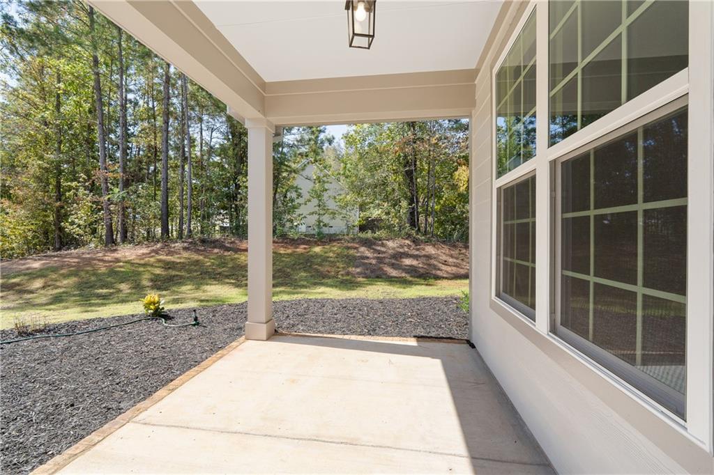 4477 Rivercliff Way Gray, GA 31032 - Photo 7 of 62 a view of a large window with an outdoor view