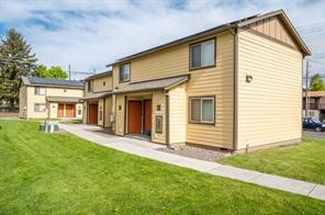 713 12th Street La Grande, OR 97850 - Photo 3 of 8 a view of a house with backyard and porch