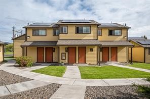 713 12th Street La Grande, OR 97850 - Photo 7 of 8 a front view of a house with a yard and trees