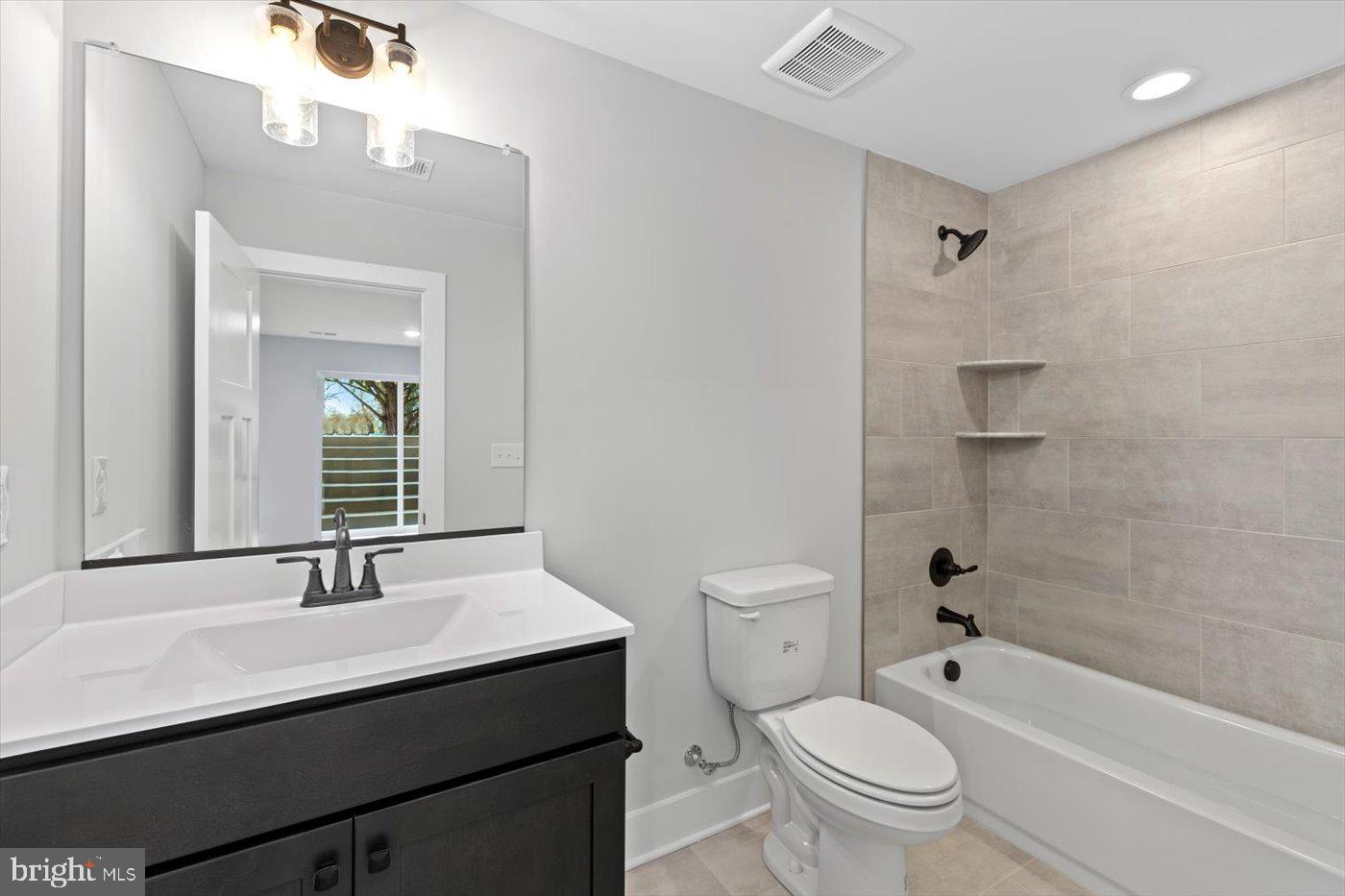 575 Solgrove Road Warrenton, VA 20186 - Photo 30 of 40 a bathroom with a sink a toilet and shower