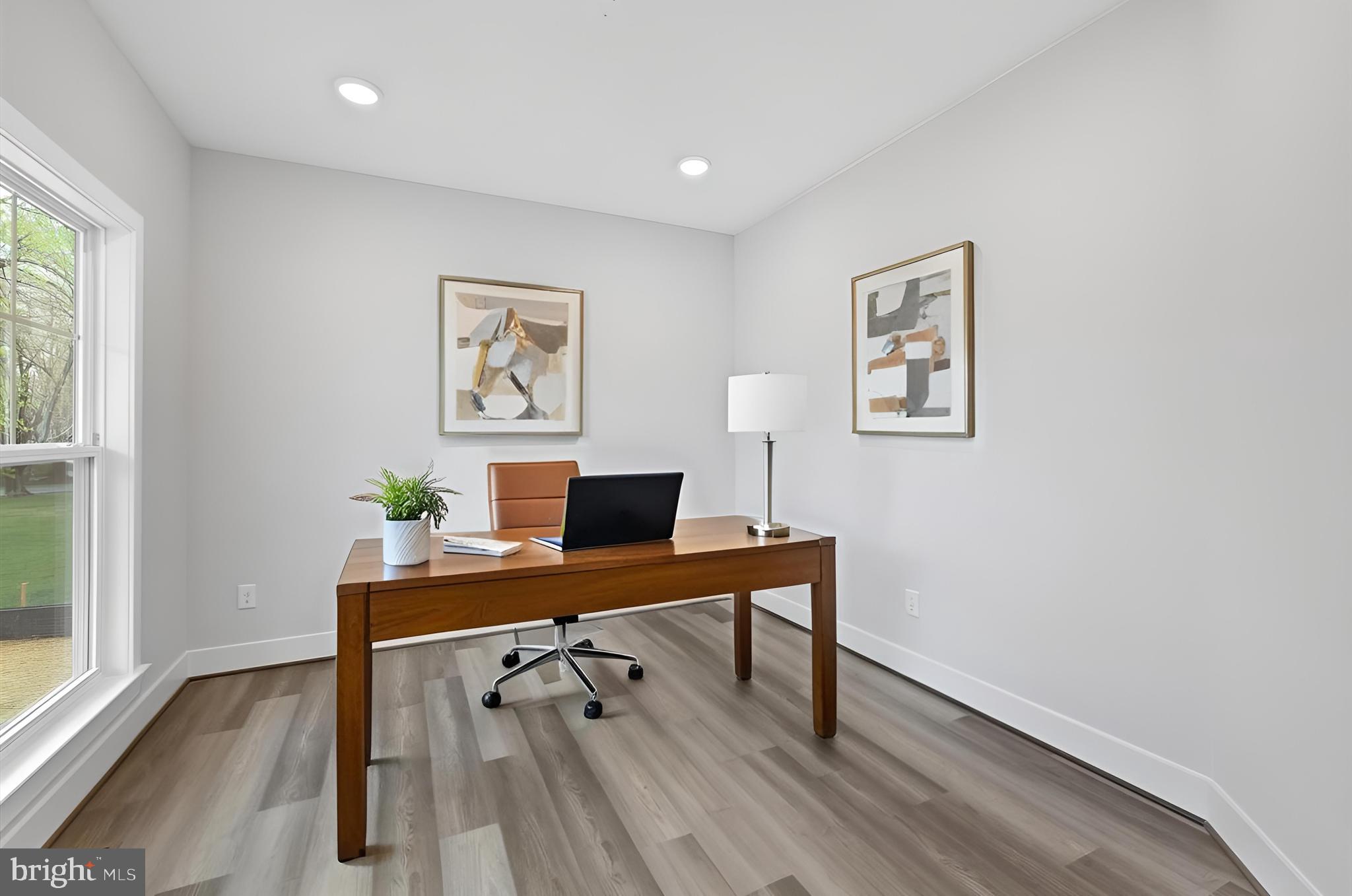 575 Solgrove Road Warrenton, VA 20186 - Photo 3 of 40 a workspace with furniture and a window