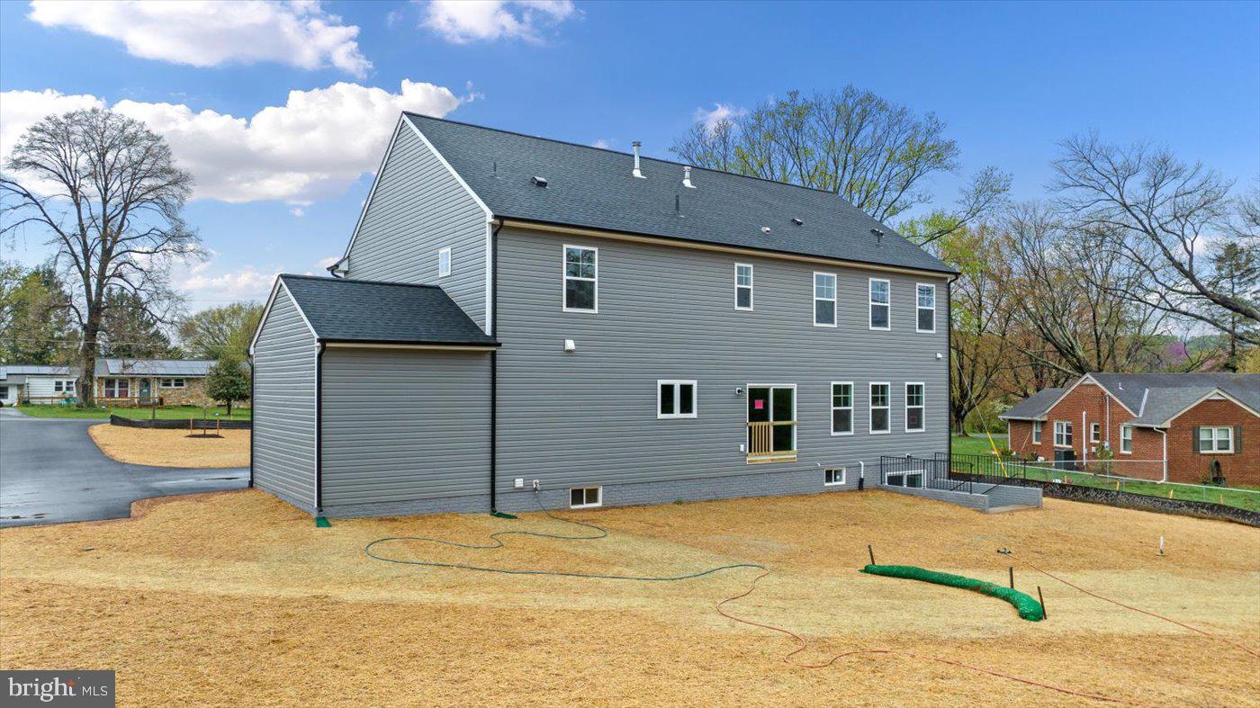 575 Solgrove Road Warrenton, VA 20186 - Photo 33 of 40 a front view of a house with a yard
