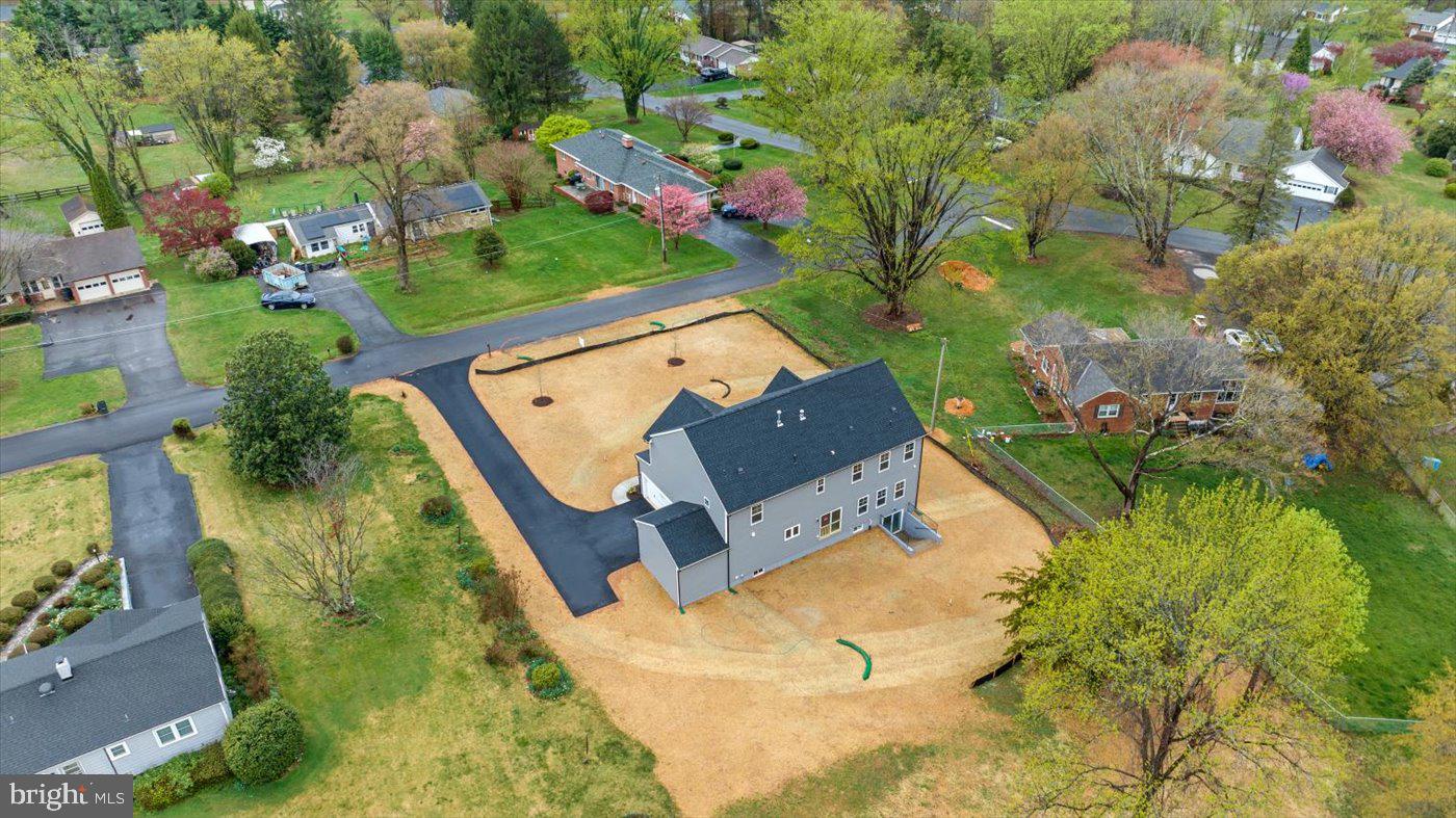 575 Solgrove Road Warrenton, VA 20186 - Photo 34 of 40 an aerial view of a house with a yard and swimming pool