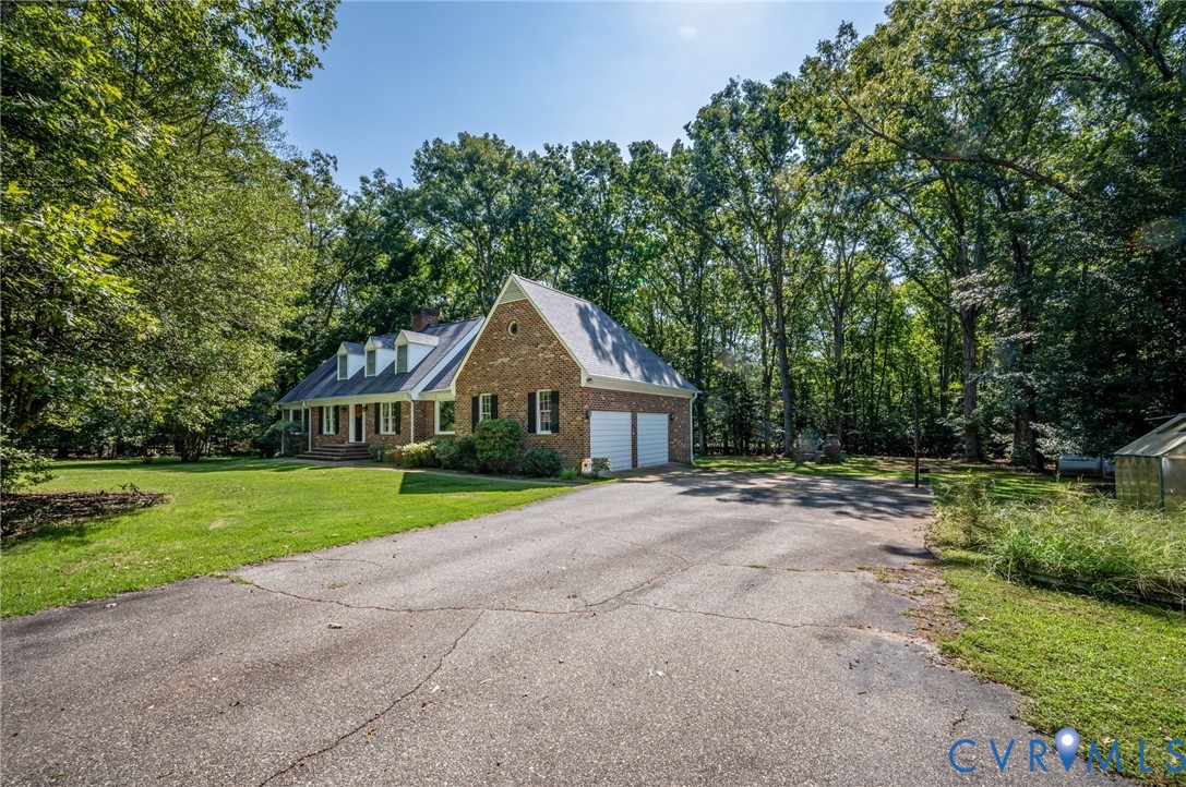 2409 Three Bridge Road Powhatan, VA 23139 - Photo 5 of 39 Paved Driveway with Gated Entrance.