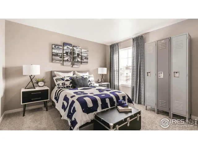 a living room with furniture a large window and a table