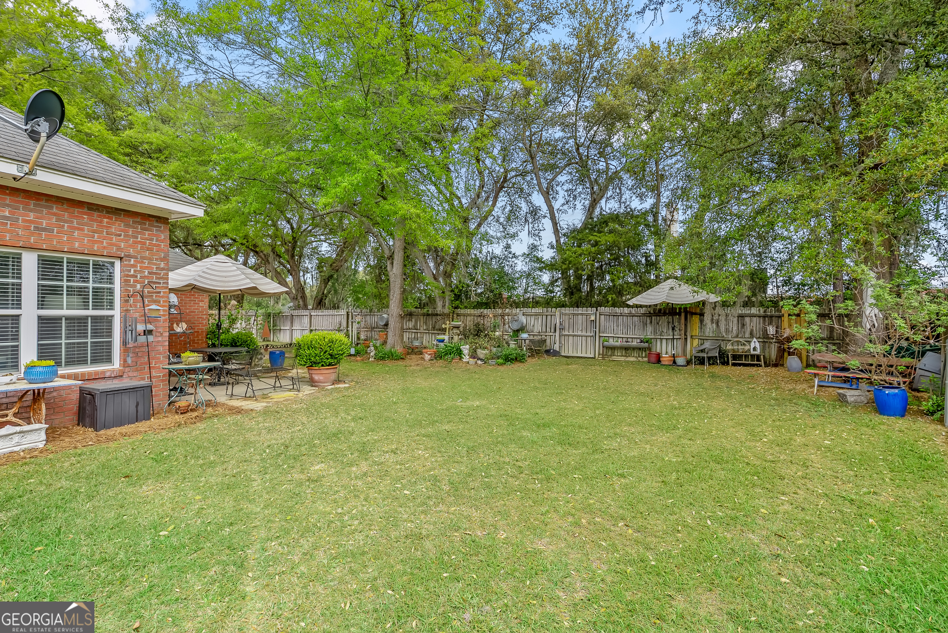 138 Brookfair Lane Leesburg, GA 31763 - Photo 23 of 30 a view of a house with backyard and sitting area