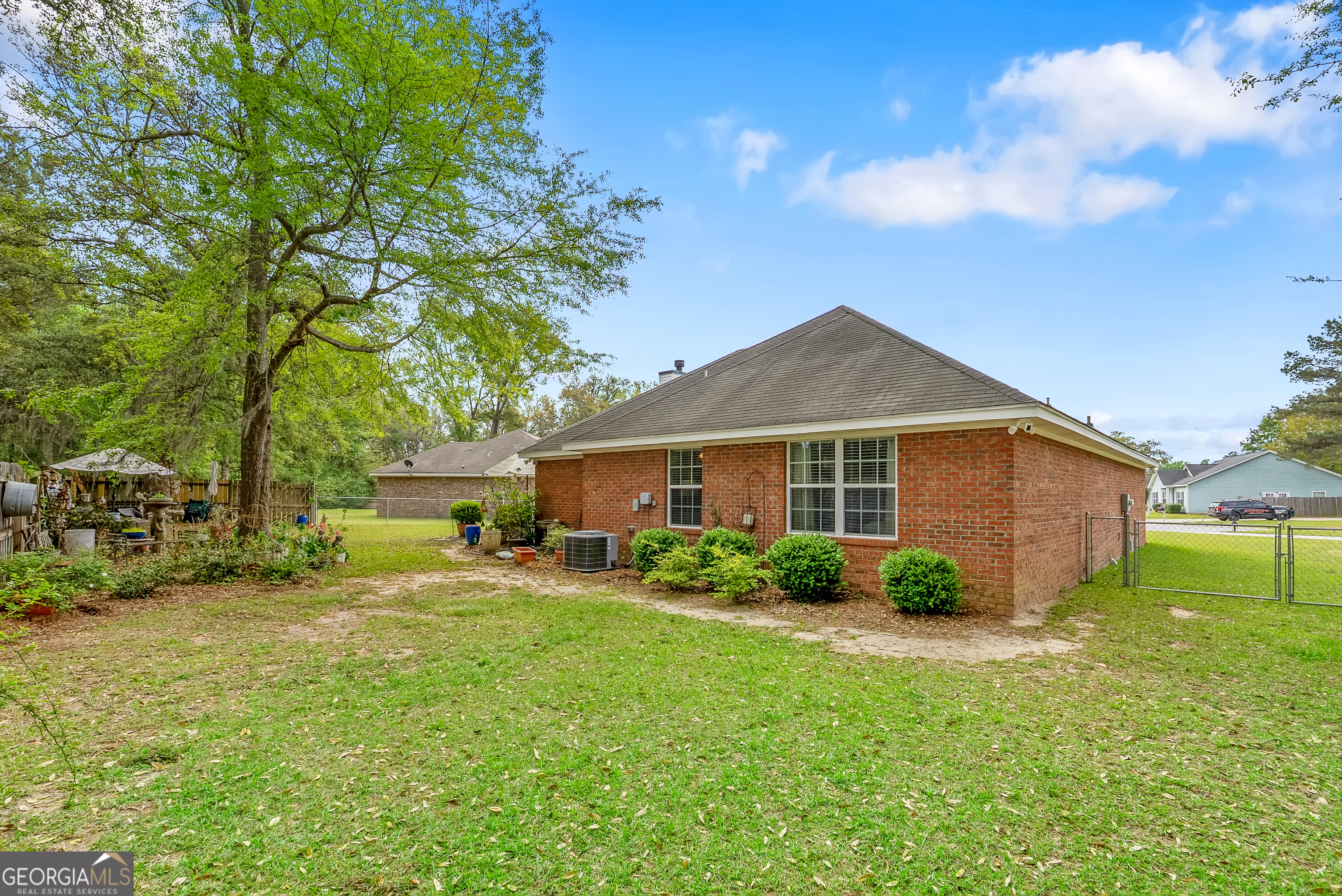 138 Brookfair Lane Leesburg, GA 31763 - Photo 24 of 30 a front view of a house with garden