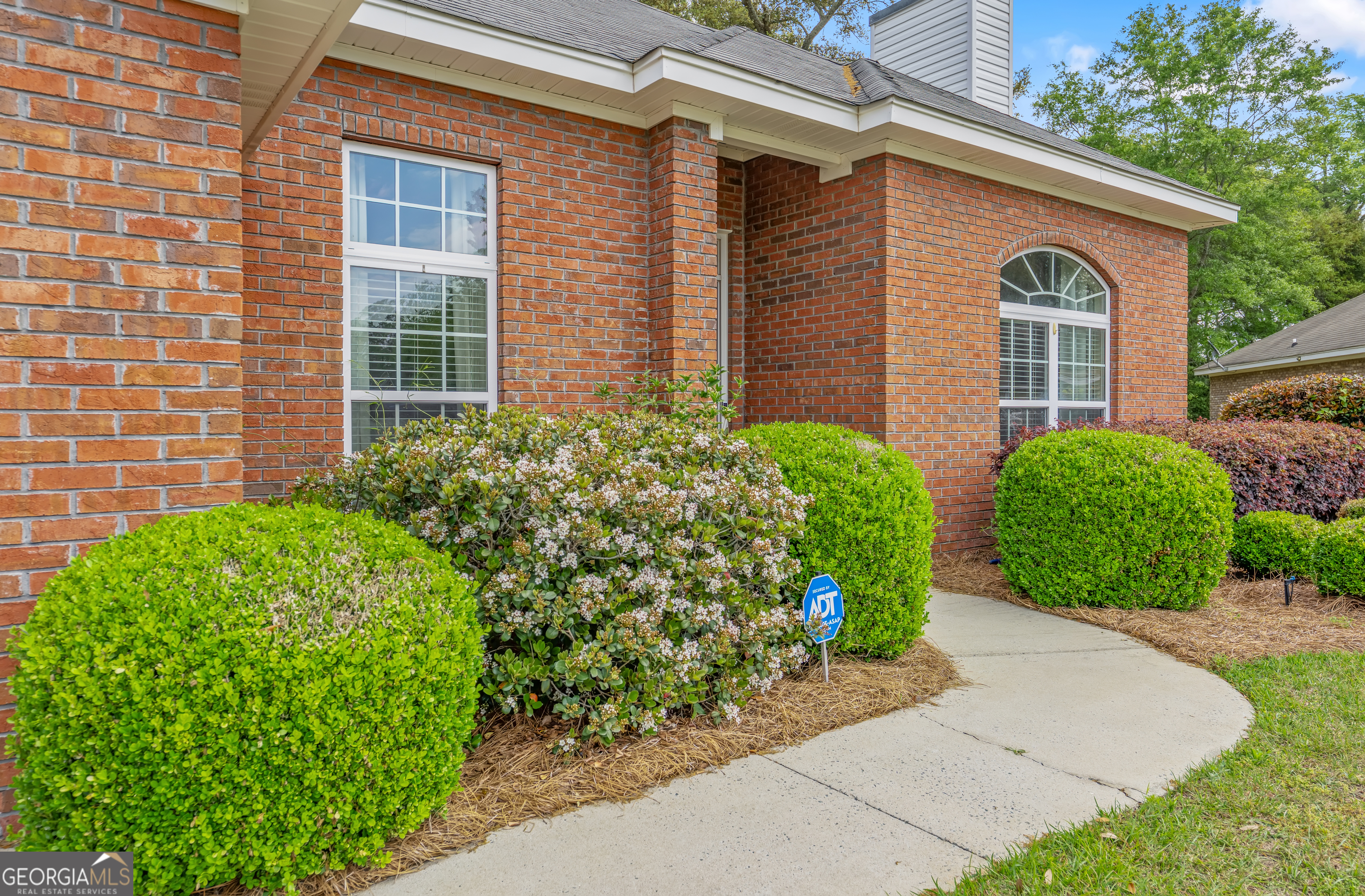 138 Brookfair Lane Leesburg, GA 31763 - Photo 3 of 30 a front view of a house with garden