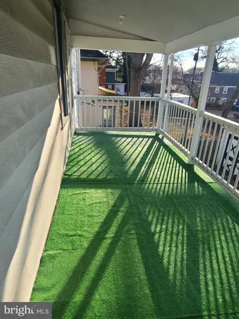 a view of balcony with garden