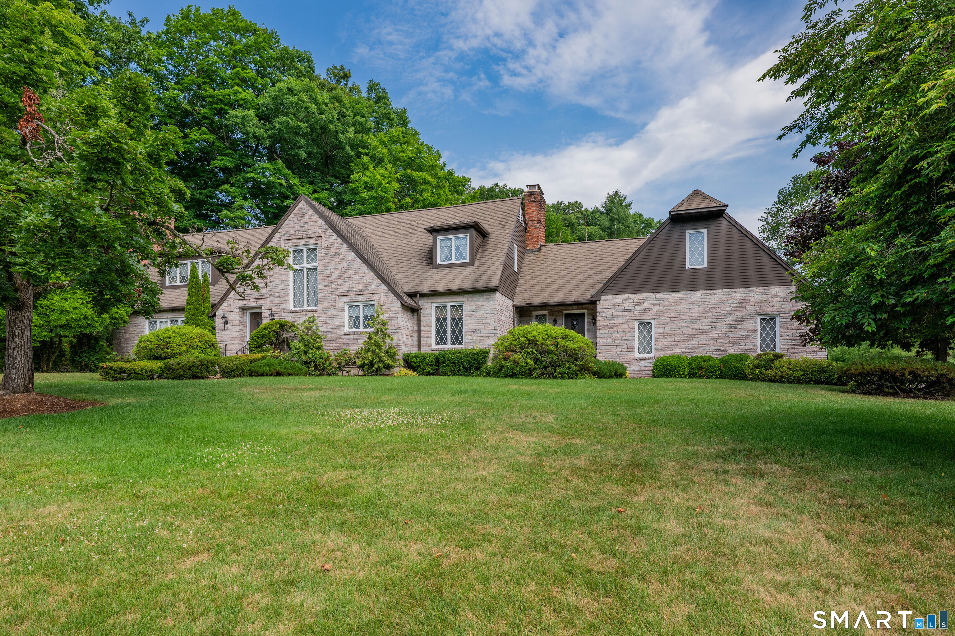 232 Maybrook Road Waterbury, CT 06708 - Photo 38 of 38 a front view of house with yard and green space