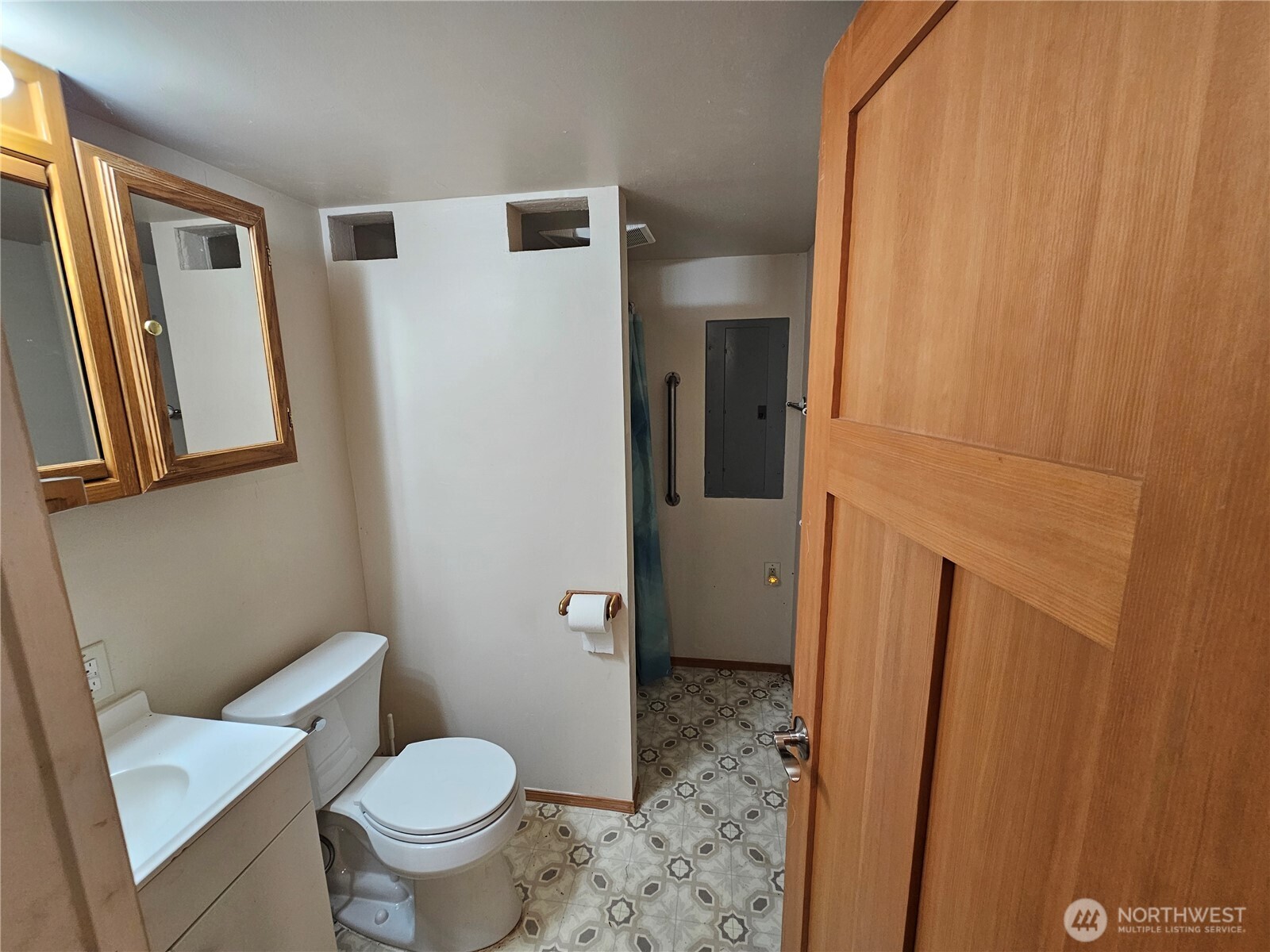 1210 Stella Road Longview, WA 98632 - Photo 17 of 28 a white toilet sitting next to a bathroom sink