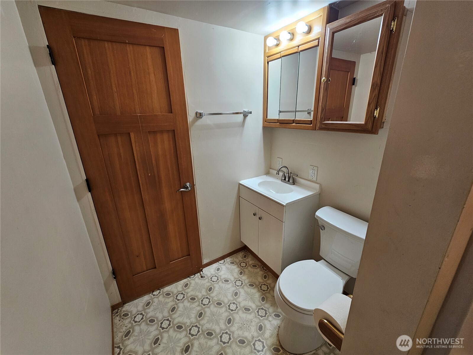 1210 Stella Road Longview, WA 98632 - Photo 19 of 28 a bathroom with a toilet sink and mirror