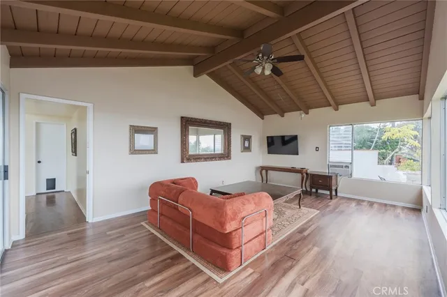 a living room with large windows