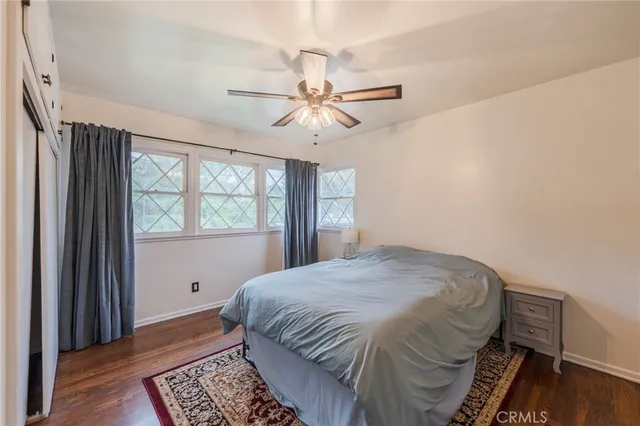 a dining room with furniture and a garden