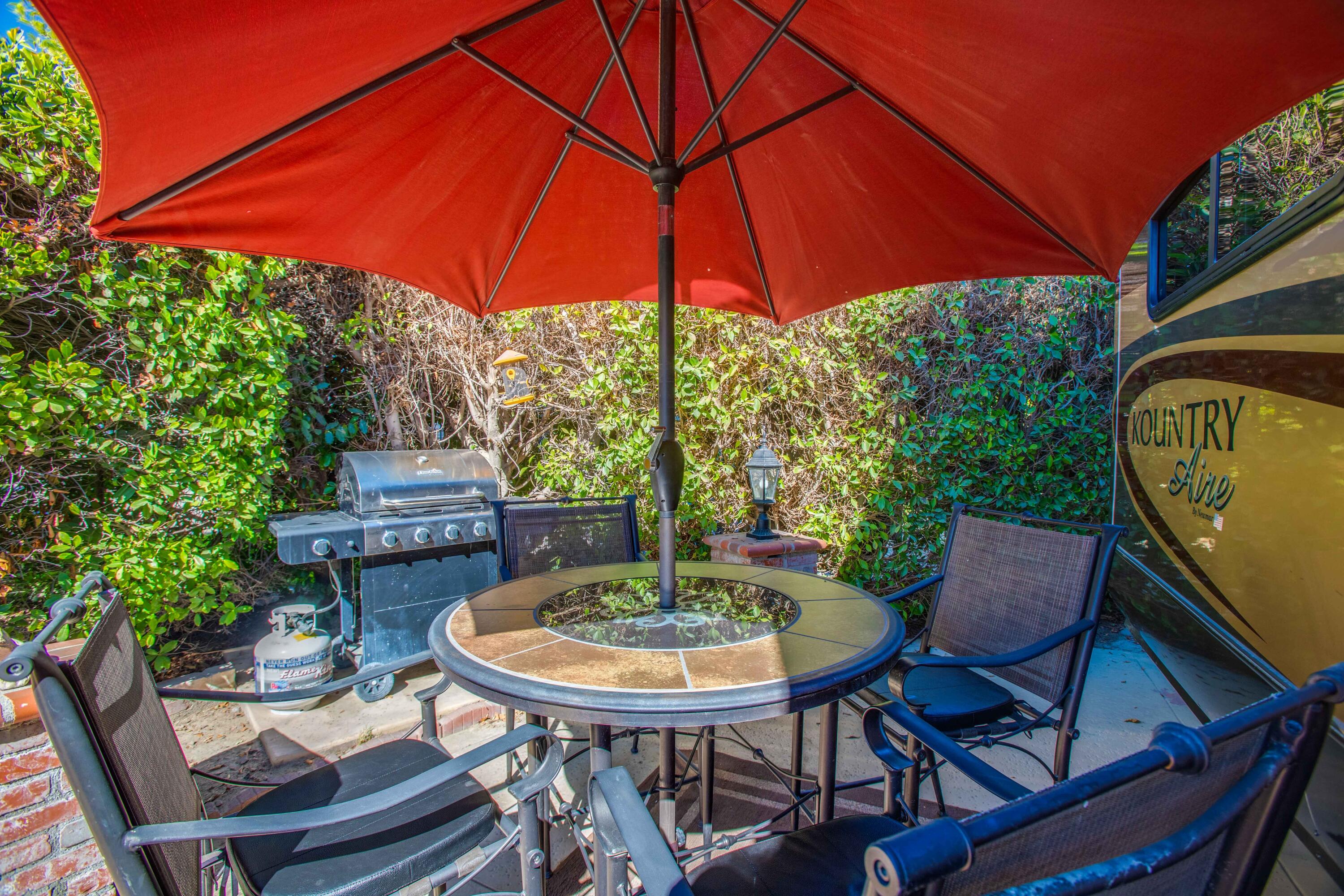 69411 Ramon Road, Unit 360 Cathedral City, CA 92234 - Photo 19 of 66 a table and chairs in patio
