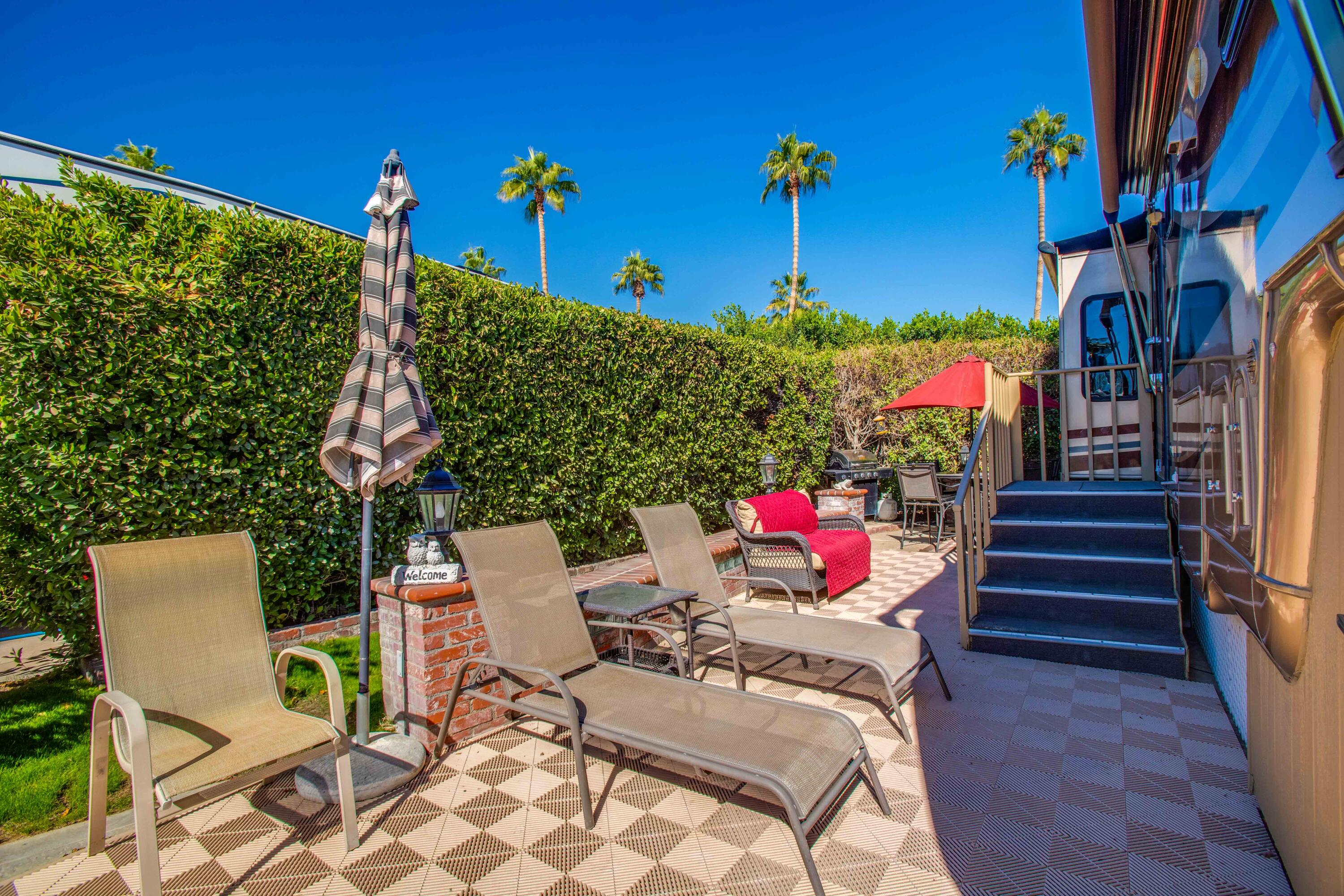 69411 Ramon Road, Unit 360 Cathedral City, CA 92234 - Photo 22 of 66 a view of a chairs and tables in patio