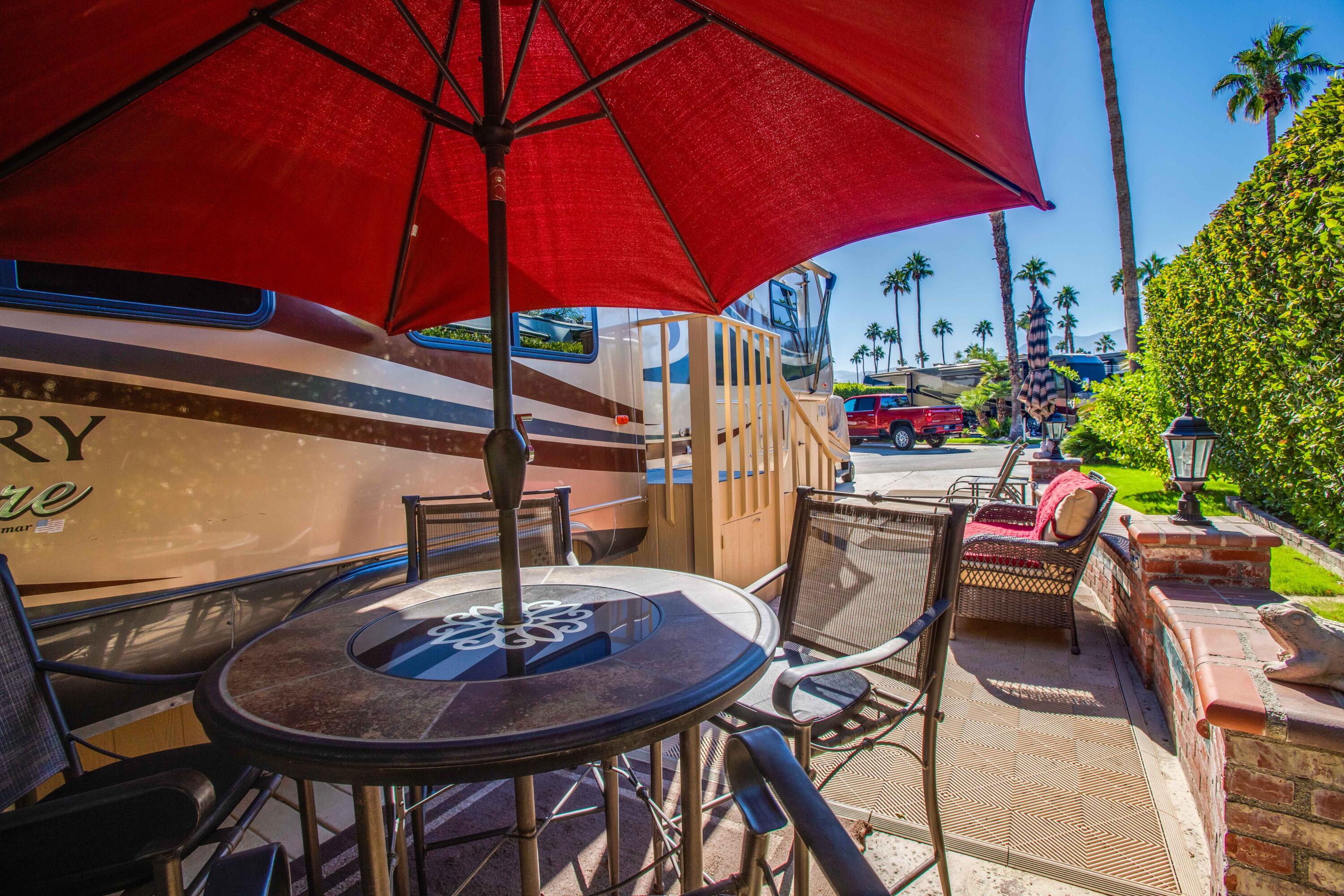 69411 Ramon Road, Unit 360 Cathedral City, CA 92234 - Photo 30 of 66 a view of a chairs and tables in the patio