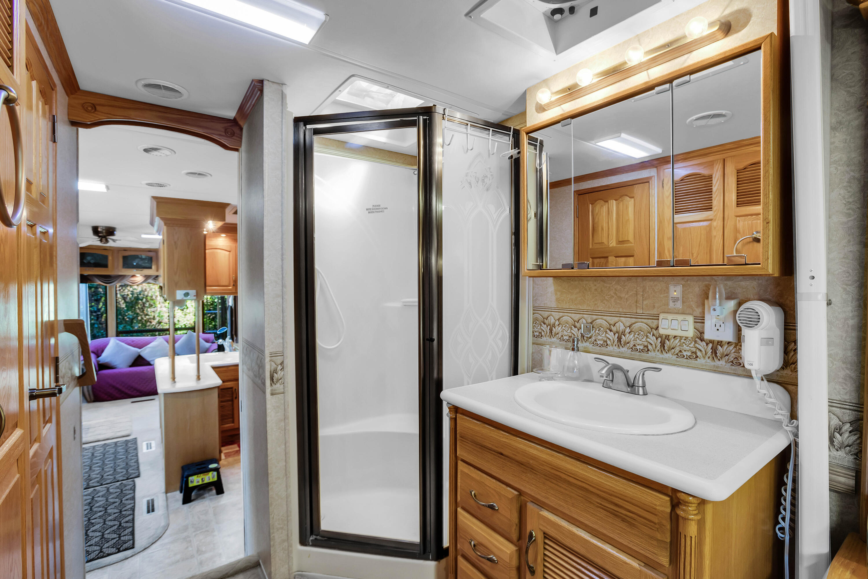 69411 Ramon Road, Unit 360 Cathedral City, CA 92234 - Photo 6 of 66 a bathroom with a sink vanity and a mirror