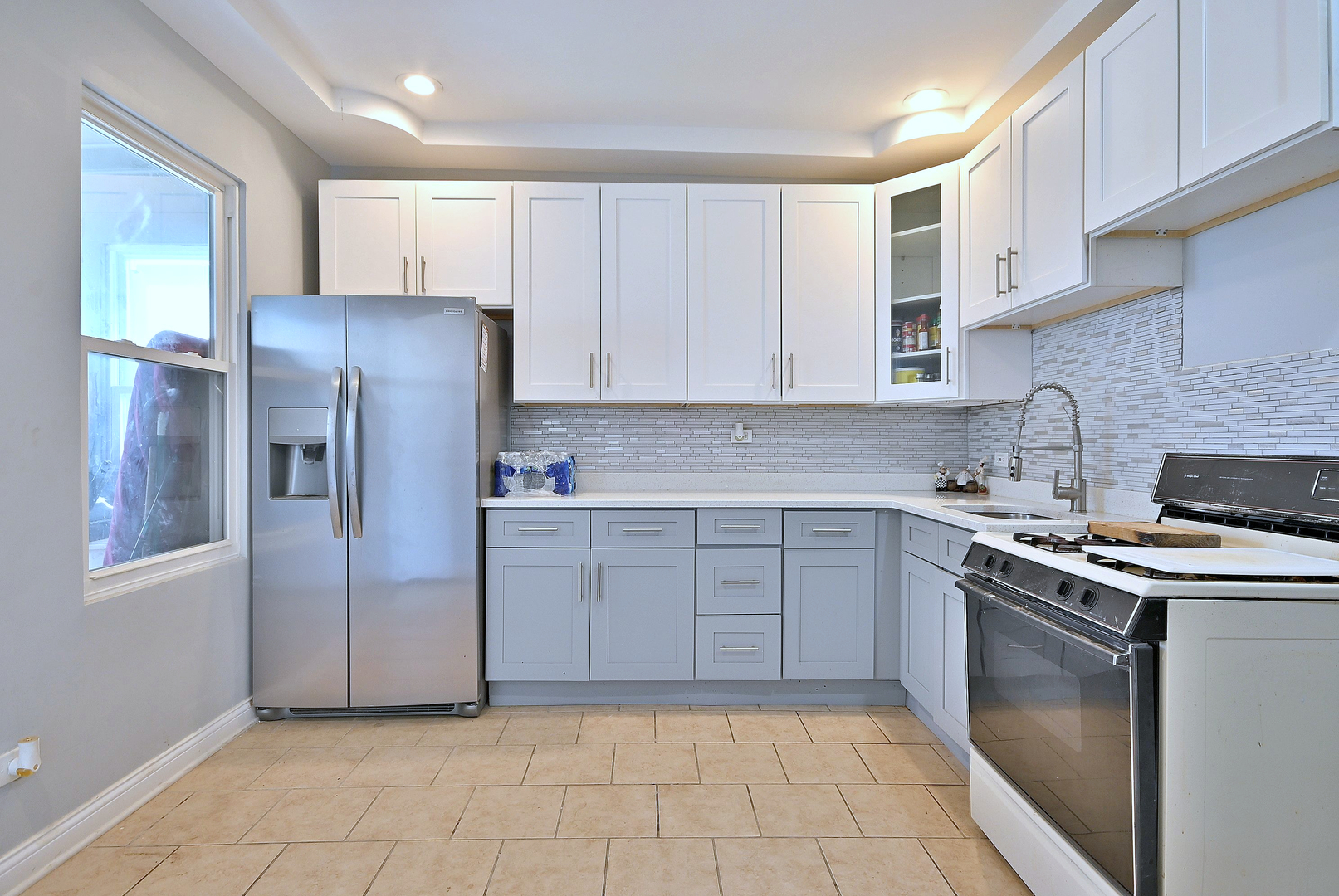 5125 South Elizabeth Street Chicago, IL 60609 - Photo 32 of 61 a kitchen with a stove sink and refrigerator