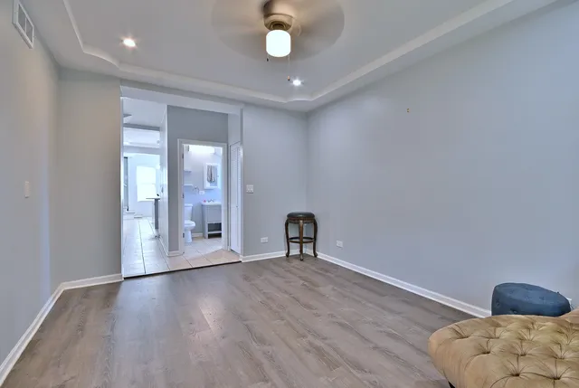 a living room with furniture a window and a fireplace
